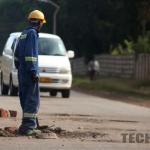 Man fixing road voluntarily in Harare