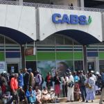 People queue up at a CABS branch