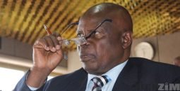 Chinamasa wearing specs