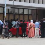 People queuing at a bank