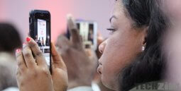 Woman using Facebook to live stream