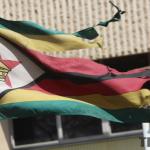 Torn Zimbabwe flag flying