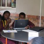 School kids on laptops