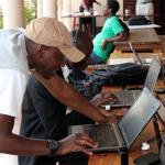 Young tech entrepreneurs at an event in Zimbabwe, co-working spaces